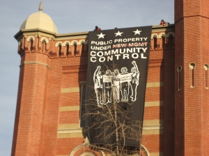 Occupy DC banner at the Franklin School on November 19, 2011. Photo taken by Rockcreek and posted on Flickr is used under the terms of its Creative Commons Attribution-NonCommercial-ShareAlike 2.0 license.